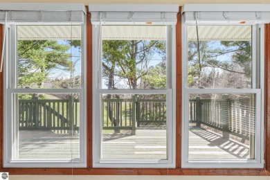 Located just within the city limits, this home offers character on Traverse City Golf and Country Club in Michigan - for sale on GolfHomes.com, golf home, golf lot