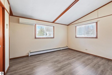 Located just within the city limits, this home offers character on Traverse City Golf and Country Club in Michigan - for sale on GolfHomes.com, golf home, golf lot