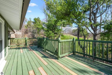 Located just within the city limits, this home offers character on Traverse City Golf and Country Club in Michigan - for sale on GolfHomes.com, golf home, golf lot
