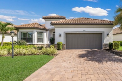 LUXURY living at its finest in the highly sought after 18-hole on Esplanade Golf and Country at Lakewood Ranch in Florida - for sale on GolfHomes.com, golf home, golf lot