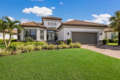 LUXURY living at its finest in the highly sought after 18-hole on Esplanade Golf and Country at Lakewood Ranch in Florida - for sale on GolfHomes.com, golf home, golf lot