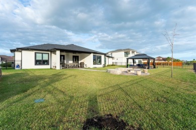 Discover your dream home at 29 Whooping Crane, a stunning on South Padre Island Golf Club in Texas - for sale on GolfHomes.com, golf home, golf lot