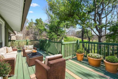 Located just within the city limits, this home offers character on Traverse City Golf and Country Club in Michigan - for sale on GolfHomes.com, golf home, golf lot
