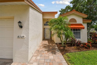 This BEAUTIFUL, CORNER LOT home has been meticulously maintained on Peridia Golf and Country Club in Florida - for sale on GolfHomes.com, golf home, golf lot