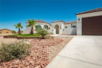 Located at 6322 S Via De Oro, Fort Mohave, Arizona, this on Los Lagos Golf Club in Arizona - for sale on GolfHomes.com, golf home, golf lot