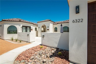 Located at 6322 S Via De Oro, Fort Mohave, Arizona, this on Los Lagos Golf Club in Arizona - for sale on GolfHomes.com, golf home, golf lot