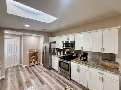 Home is located in Water Oak Country Club Estates, an active 55 on Water Oak Country Club Estates in Florida - for sale on GolfHomes.com, golf home, golf lot