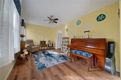 Charming home in well-kept Neighborhood with a Community Dock on Sycamore Creek Golf Club in Missouri - for sale on GolfHomes.com, golf home, golf lot