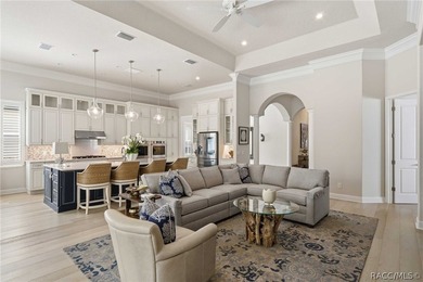 THIS GORGEOUS CUSTOM HOME welcomes you with an intricately on Skyview At Terra Vista Golf and Country Club in Florida - for sale on GolfHomes.com, golf home, golf lot