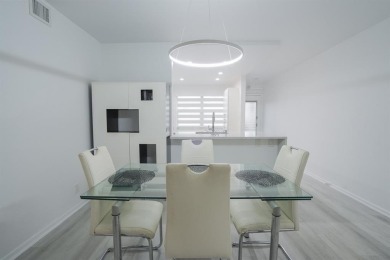 Step into this beautifully renovated, move-in ready first floor on Wynmoor Golf Course in Florida - for sale on GolfHomes.com, golf home, golf lot