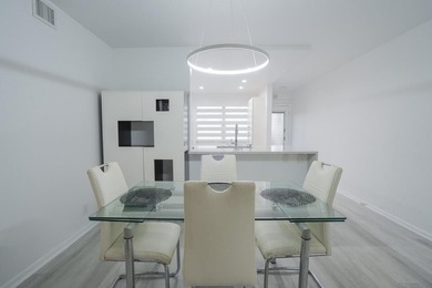 Step into this beautifully renovated, move-in ready first floor on Wynmoor Golf Course in Florida - for sale on GolfHomes.com, golf home, golf lot