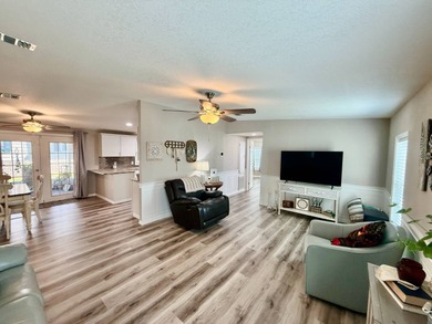 Home is located in Water Oak Country Club Estates, an active 55 on Water Oak Country Club Estates in Florida - for sale on GolfHomes.com, golf home, golf lot