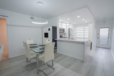 Step into this beautifully renovated, move-in ready first floor on Wynmoor Golf Course in Florida - for sale on GolfHomes.com, golf home, golf lot