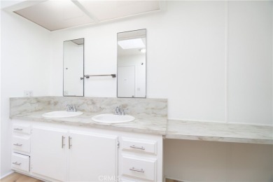 MUST SEE! TURN KEY CATHEDRAL CITY MANUFACTURED HOME! PREMIUM on Date Palm Country Club in California - for sale on GolfHomes.com, golf home, golf lot