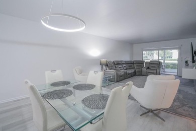 Step into this beautifully renovated, move-in ready first floor on Wynmoor Golf Course in Florida - for sale on GolfHomes.com, golf home, golf lot