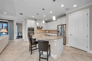 Nestled within the exclusive community of Terzetto at The Colony on The Colony Golf and Country Club in Florida - for sale on GolfHomes.com, golf home, golf lot