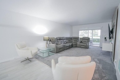 Step into this beautifully renovated, move-in ready first floor on Wynmoor Golf Course in Florida - for sale on GolfHomes.com, golf home, golf lot