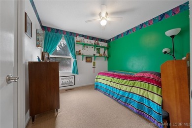 Charming home in well-kept Neighborhood with a Community Dock on Sycamore Creek Golf Club in Missouri - for sale on GolfHomes.com, golf home, golf lot