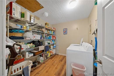 Charming home in well-kept Neighborhood with a Community Dock on Sycamore Creek Golf Club in Missouri - for sale on GolfHomes.com, golf home, golf lot