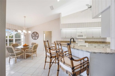 Escape to Elegance in a **MOVE-IN READY GOLF COURSE HOME** on Pinemoor West Golf Club in Florida - for sale on GolfHomes.com, golf home, golf lot