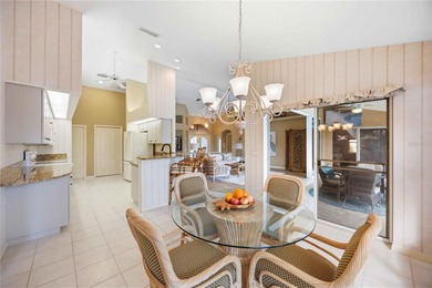 Escape to Elegance in a **MOVE-IN READY GOLF COURSE HOME** on Pinemoor West Golf Club in Florida - for sale on GolfHomes.com, golf home, golf lot