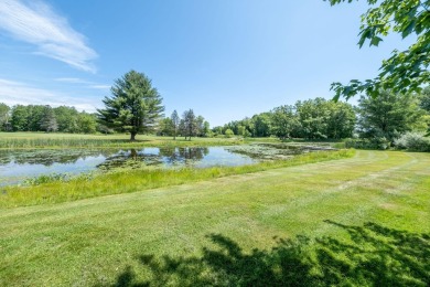 Trapper Woods Condo at Canadian Lakes.  High demand property on Canadian Lakes Country Club-The Pines Course in Michigan - for sale on GolfHomes.com, golf home, golf lot