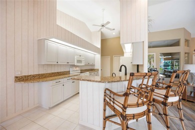 Escape to Elegance in a **MOVE-IN READY GOLF COURSE HOME** on Pinemoor West Golf Club in Florida - for sale on GolfHomes.com, golf home, golf lot