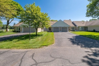 Trapper Woods Condo at Canadian Lakes.  High demand property on Canadian Lakes Country Club-The Pines Course in Michigan - for sale on GolfHomes.com, golf home, golf lot