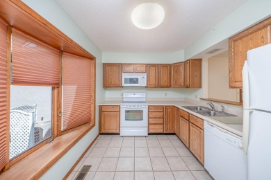 Trapper Woods Condo at Canadian Lakes.  High demand property on Canadian Lakes Country Club-The Pines Course in Michigan - for sale on GolfHomes.com, golf home, golf lot