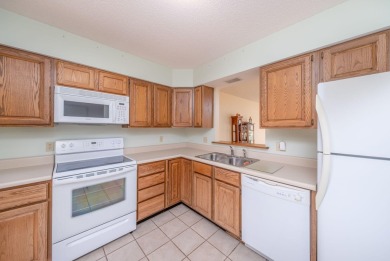 Trapper Woods Condo at Canadian Lakes.  High demand property on Canadian Lakes Country Club-The Pines Course in Michigan - for sale on GolfHomes.com, golf home, golf lot