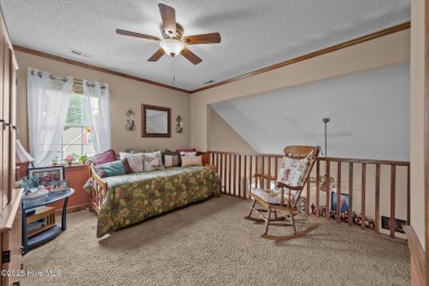 Welcome to your dream home nestled in a serene golf course on Rock Creek Country Club in North Carolina - for sale on GolfHomes.com, golf home, golf lot