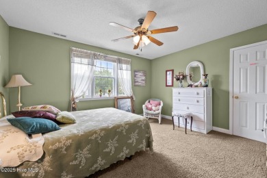 Welcome to your dream home nestled in a serene golf course on Rock Creek Country Club in North Carolina - for sale on GolfHomes.com, golf home, golf lot