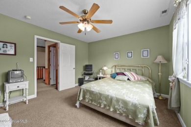 Welcome to your dream home nestled in a serene golf course on Rock Creek Country Club in North Carolina - for sale on GolfHomes.com, golf home, golf lot