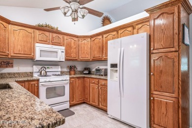 Welcome Home! This 2 bedroom with a bonus room, 2 bath home is on Lake Tansi Village Country Club in Tennessee - for sale on GolfHomes.com, golf home, golf lot