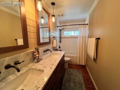 This is the one you've been waiting for!  This 4 bedroom, 3  1/2 on Woodmoor Pines Country Club in Colorado - for sale on GolfHomes.com, golf home, golf lot