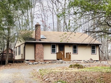 Escape to the Poconos in this beautifully updated 3-bedroom on Pocono Farms Country Club in Pennsylvania - for sale on GolfHomes.com, golf home, golf lot