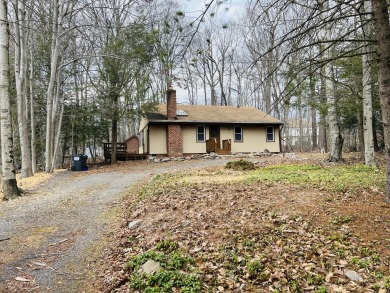 Escape to the Poconos in this beautifully updated 3-bedroom on Pocono Farms Country Club in Pennsylvania - for sale on GolfHomes.com, golf home, golf lot