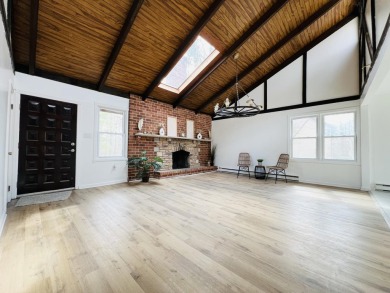 Escape to the Poconos in this beautifully updated 3-bedroom on Pocono Farms Country Club in Pennsylvania - for sale on GolfHomes.com, golf home, golf lot