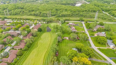 Welcome to this spacious and inviting 3-bedroom, 2-bath on Oak Hills Country Club in Illinois - for sale on GolfHomes.com, golf home, golf lot