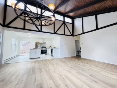 Escape to the Poconos in this beautifully updated 3-bedroom on Pocono Farms Country Club in Pennsylvania - for sale on GolfHomes.com, golf home, golf lot
