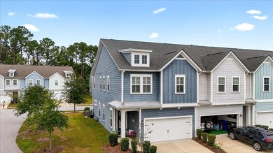 Welcome to 2897 Eddy Drive, a stunning end unit townhouse in the on Dunes West Golf Club in South Carolina - for sale on GolfHomes.com, golf home, golf lot