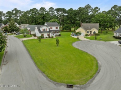 Welcome to your dream home nestled in a serene golf course on Rock Creek Country Club in North Carolina - for sale on GolfHomes.com, golf home, golf lot