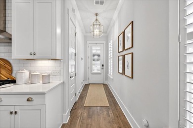 Welcome to 2897 Eddy Drive, a stunning end unit townhouse in the on Dunes West Golf Club in South Carolina - for sale on GolfHomes.com, golf home, golf lot