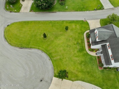 Welcome to your dream home nestled in a serene golf course on Rock Creek Country Club in North Carolina - for sale on GolfHomes.com, golf home, golf lot