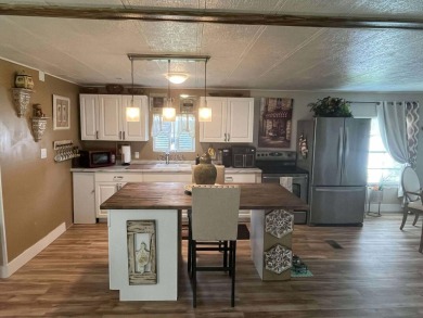 Welcome to 15 La Costa Lane, a charming 2-bedroom, 2-bath on Spanish Lakes Golf Village in Florida - for sale on GolfHomes.com, golf home, golf lot