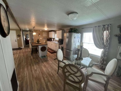 Welcome to 15 La Costa Lane, a charming 2-bedroom, 2-bath on Spanish Lakes Golf Village in Florida - for sale on GolfHomes.com, golf home, golf lot