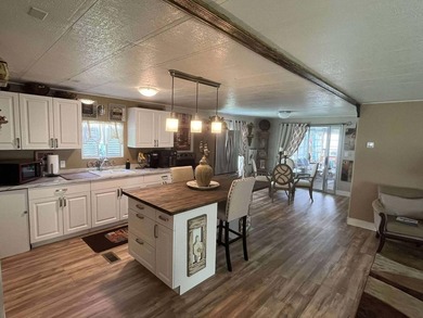 Welcome to 15 La Costa Lane, a charming 2-bedroom, 2-bath on Spanish Lakes Golf Village in Florida - for sale on GolfHomes.com, golf home, golf lot