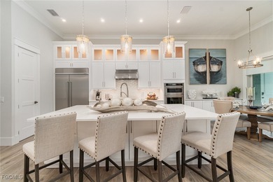 Step into elevated Southwest Cape Coral living where thoughtful on Royal Tee Country Club in Florida - for sale on GolfHomes.com, golf home, golf lot