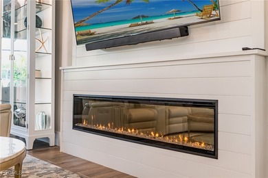 Step into elevated Southwest Cape Coral living where thoughtful on Royal Tee Country Club in Florida - for sale on GolfHomes.com, golf home, golf lot