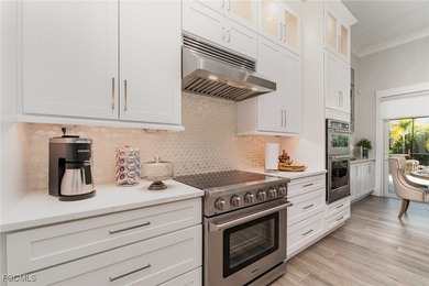 Step into elevated Southwest Cape Coral living where thoughtful on Royal Tee Country Club in Florida - for sale on GolfHomes.com, golf home, golf lot